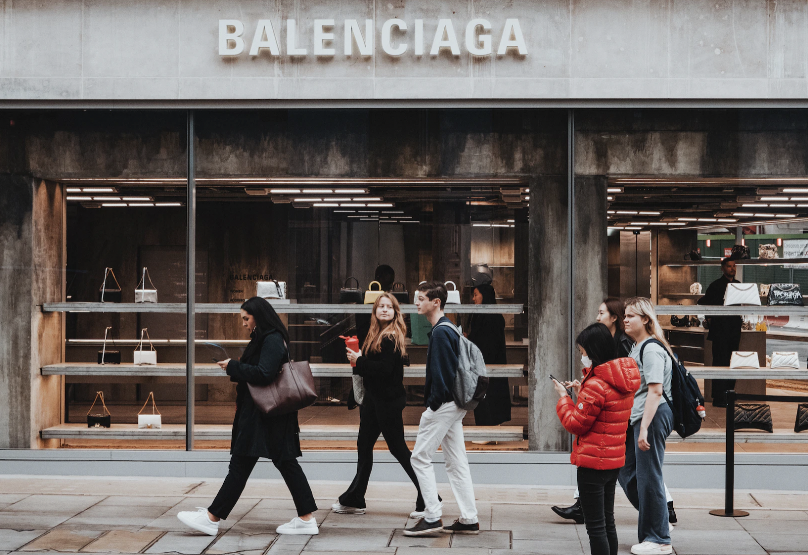 Screen grab showing the Balenciaga ARENA bag (left) and the original