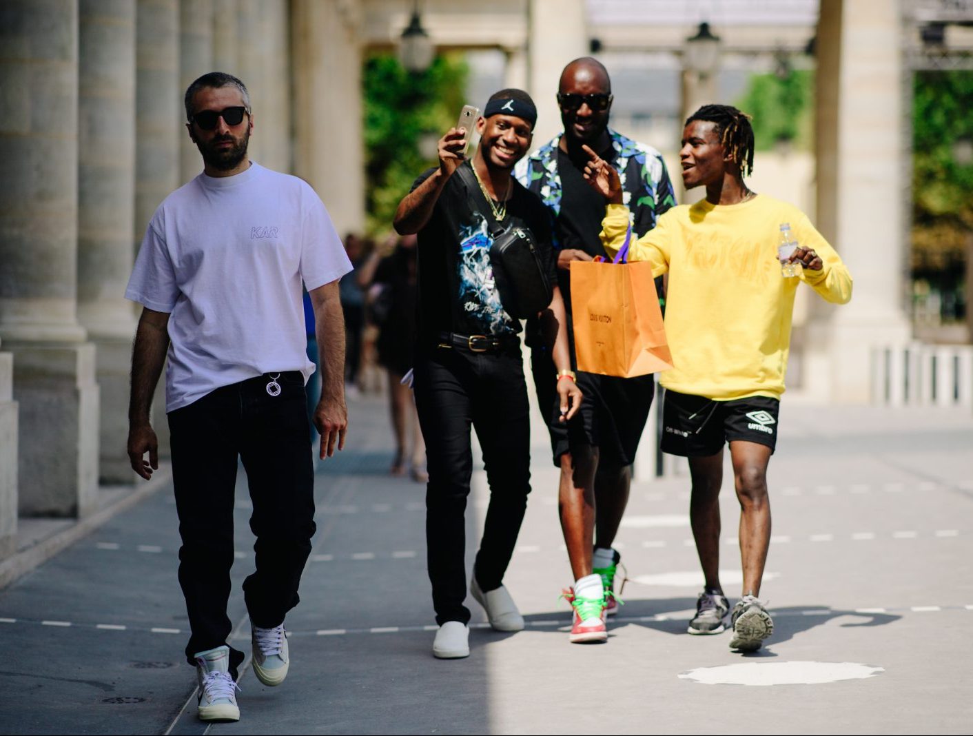 Stylist Virgil Abloh and rapper ASAP Rocky pose after the Louis