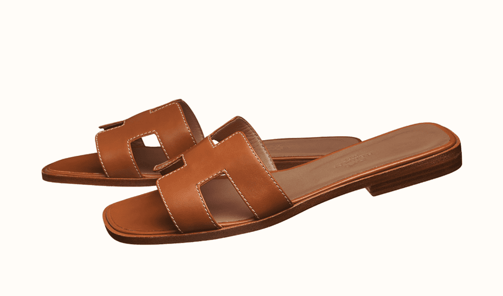 Copycat Versions of Hermès’ Oran Sandals Are Everywhere. So, Why Isn’t the Brand Suing? 