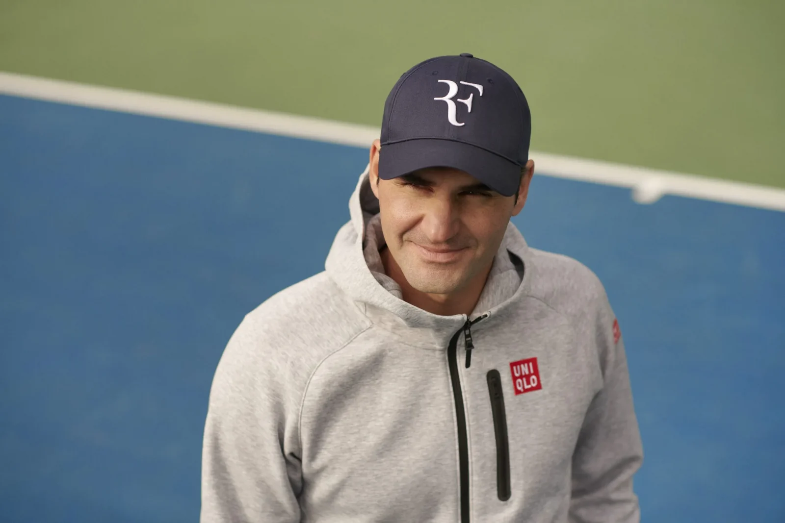 Federer wearing an "RF" logo hat