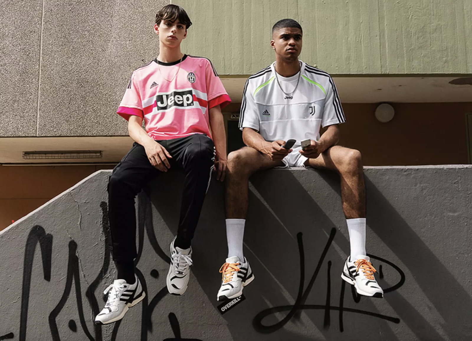 Two male models wearing clothing from a Juventus, adidas collaboration