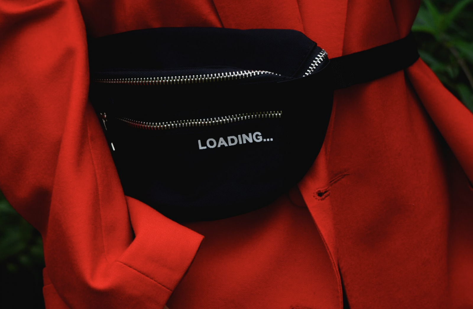 A fanny pack with the word Loading ... on it