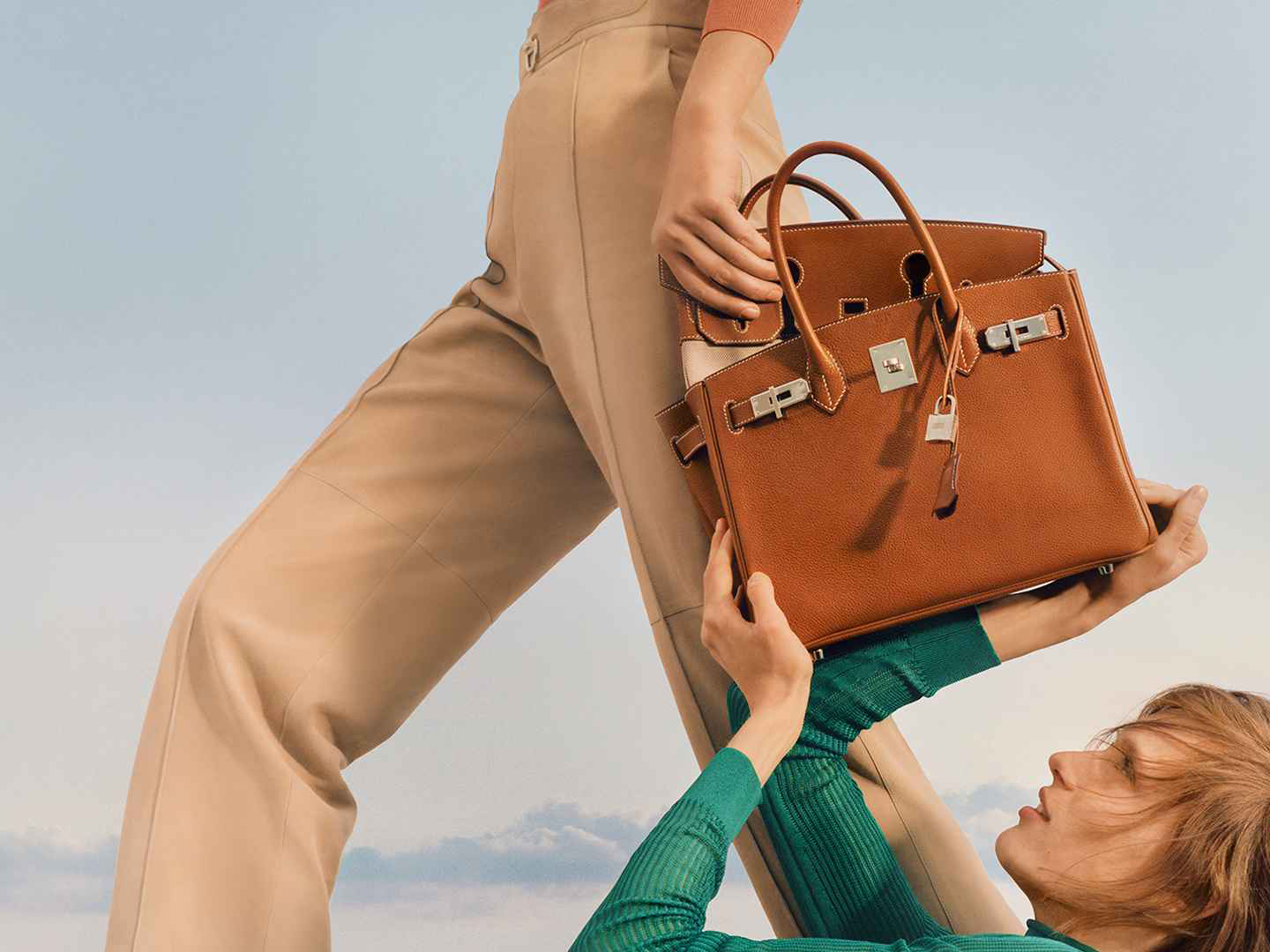 An ad campaign featuring an Hermes Birkin bag